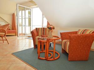 Posezení v ubytování Villa Vilmblick - Wohnung 23 mit Meerblick-Balkon