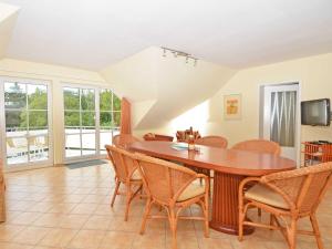 TV a/nebo společenská místnost v ubytování Villa Vilmblick - Wohnung 23 mit Meerblick-Balkon