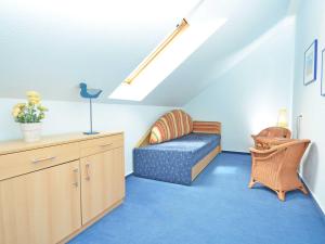 Posezení v ubytování Villa Vilmblick - Wohnung 23 mit Meerblick-Balkon