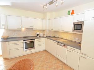 Kuchyň nebo kuchyňský kout v ubytování Villa Vilmblick - Wohnung 23 mit Meerblick-Balkon