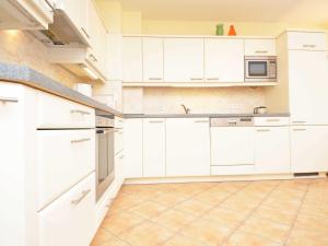 Kuchyň nebo kuchyňský kout v ubytování Villa Vilmblick - Wohnung 23 mit Meerblick-Balkon