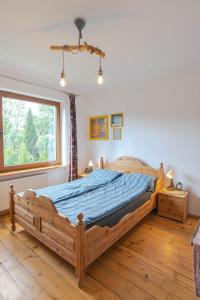Posteľ alebo postele v izbe v ubytovaní Apartament Latynoski z ogrodem - Dream Apart