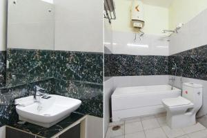 SohānaにあるFabHotel Town Prideの洗面台、トイレ、浴槽を備えたバスルーム +21枚の写真