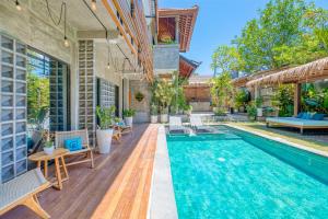 an image of a swimming pool in a house at Leafy Home Canggu in Canggu