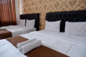 Letto o letti in una camera di Griya Limasan Gunung Kidul