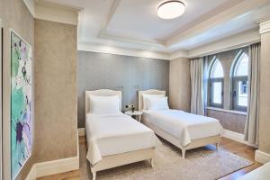 Postel nebo postele na pokoji v ubytování Club Privé By Rixos Saadiyat