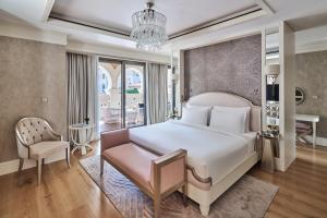 Postel nebo postele na pokoji v ubytování Club Privé By Rixos Saadiyat