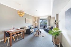 Area soggiorno di King Suite Dreams - Poolside Living on the Esplanade