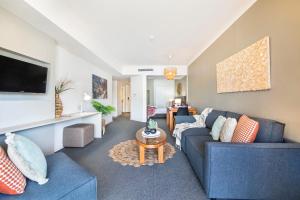 Area soggiorno di King Suite Dreams - Poolside Living on the Esplanade
