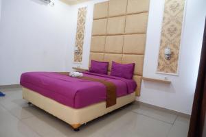 Letto o letti in una camera di Griya Limasan Gunung Kidul
