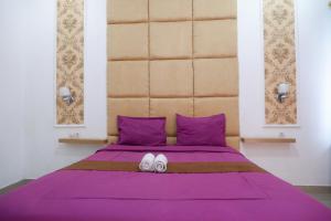 Letto o letti in una camera di Griya Limasan Gunung Kidul