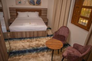 Letto o letti in una camera di فندق المدينة القديمة Old Town Hotel