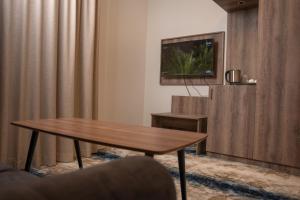 TV o dispositivi per l'intrattenimento presso فندق المدينة القديمة Old Town Hotel