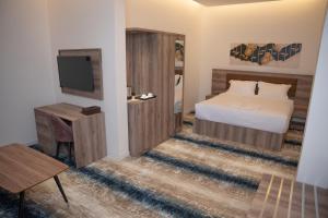 Letto o letti in una camera di فندق المدينة القديمة Old Town Hotel