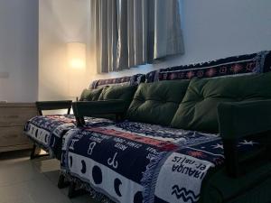 Voodi või voodid majutusasutuse Daiwen Homestay toas