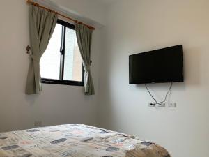 TV a/nebo společenská místnost v ubytování Daiwen Homestay