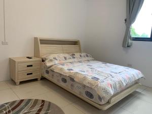 Voodi või voodid majutusasutuse Daiwen Homestay toas