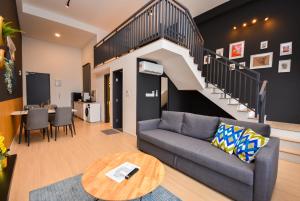 Χώρος καθιστικού στο Sunway Grid Loft Suite by Nest Home【Olympic Size Pool】