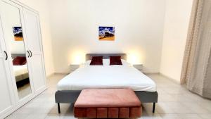 A bed or beds in a room at Central Rooms Best Vacation Ever