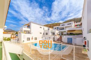 Bazén v ubytování Holiday Apartments Oasis nebo v jeho okolí