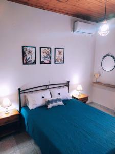 Katil atau katil-katil dalam bilik di Olivo Apartment