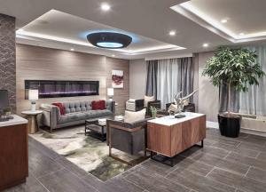 Posezení v ubytování Sandman Signature Plano-Frisco Hotel