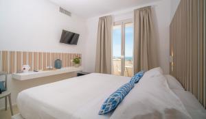 Postel nebo postele na pokoji v ubytování Mia Hotel Numana