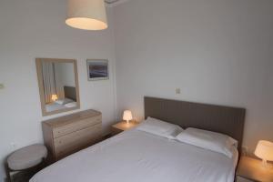 Posteľ alebo postele v izbe v ubytovaní IRIDA 2Br Apartment with amazing sea view.