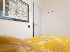 A bed or beds in a room at La CRI Bed & Breakfast