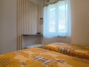 A bed or beds in a room at La CRI Bed & Breakfast