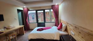 Postel nebo postele na pokoji v ubytování Dang Khoa Garden Inn Homestay
