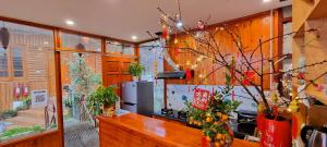 Kuchyň nebo kuchyňský kout v ubytování Dang Khoa Garden Inn Homestay