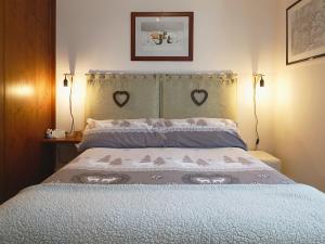 A bed or beds in a room at La CRI Bed & Breakfast