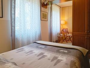 A bed or beds in a room at La CRI Bed & Breakfast