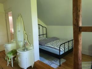 Postel nebo postele na pokoji v ubytování Ferienhaus Dreamholiday - Stilvolles großes Ferienhaus mit Garten