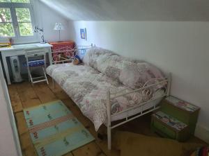 Postel nebo postele na pokoji v ubytování Ferienhaus Dreamholiday - Stilvolles großes Ferienhaus mit Garten