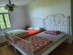 Postel nebo postele na pokoji v ubytování Ferienhaus Dreamholiday - Stilvolles großes Ferienhaus mit Garten