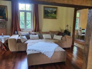 Posezení v ubytování Ferienhaus Dreamholiday - Stilvolles großes Ferienhaus mit Garten
