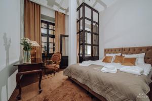 Posteľ alebo postele v izbe v ubytovaní Apartamenty Lokalna