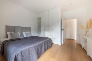 Posteľ alebo postele v izbe v ubytovaní S35 Apartments Gdynia Orłowo