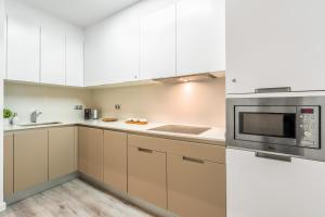 Kuchyň nebo kuchyňský kout v ubytování Apartamento en excelente ubicación, centro de Barcelona