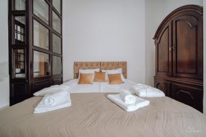 Posteľ alebo postele v izbe v ubytovaní Apartamenty Lokalna