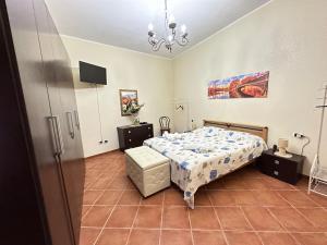 Un pat sau paturi într-o cameră la Villa Dalila