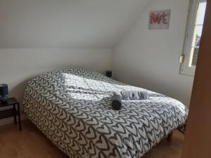 Posteľ alebo postele v izbe v ubytovaní A l'Orée du Bois Les Bouleaux