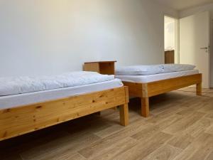 Postel nebo postele na pokoji v ubytování Apartmán Chvalšiny