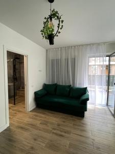 Posezení v ubytování Garden Apartment Oradea