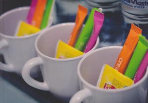 three coffee cups filled with different colored pencils at My Hotel @ Sentral in Kuala Lumpur