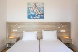 Postel nebo postele na pokoji v ubytování Bella Karpathos Villas