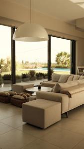 Posteľ alebo postele v izbe v ubytovaní Villa Gardenia, villa de luxe avec piscine à débordement
