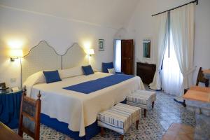 Postel nebo postele na pokoji v ubytování Hotel Villa Cimbrone